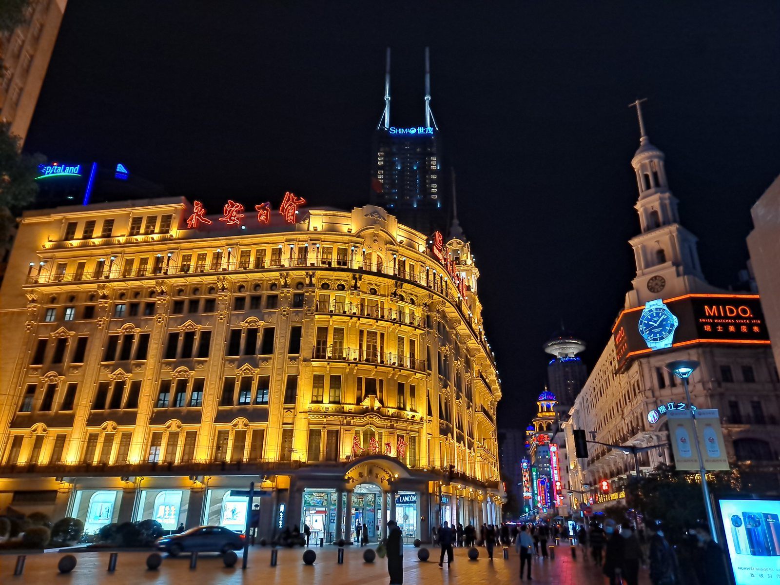Illuminated department stores on East Nanjing Road in Shanghai at night